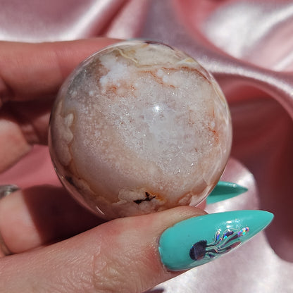 Pink flower agate/ Carnelian sphere