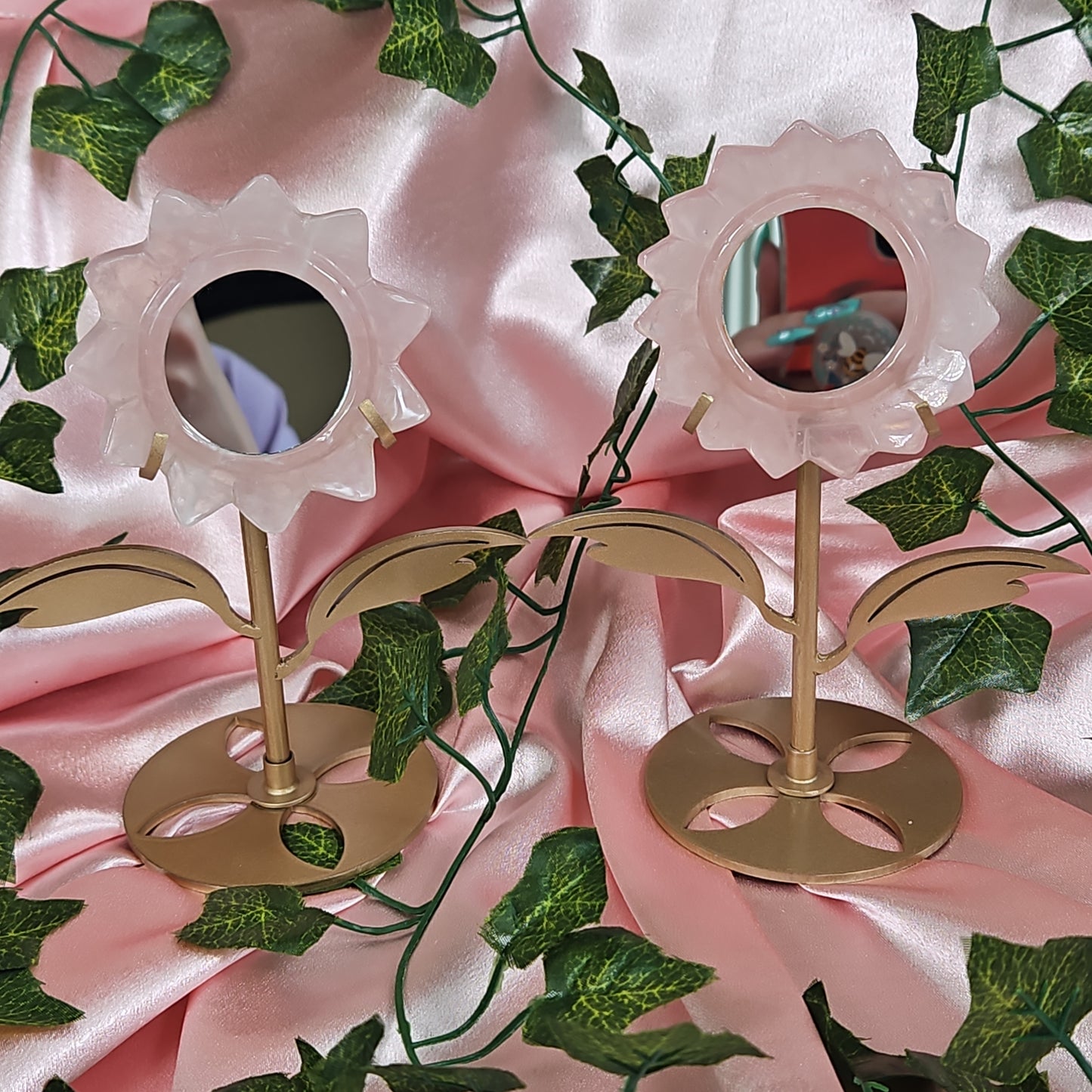 Rose quartz mirror on stand