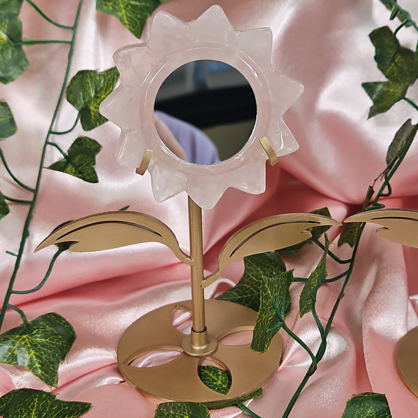 Rose quartz mirror on stand
