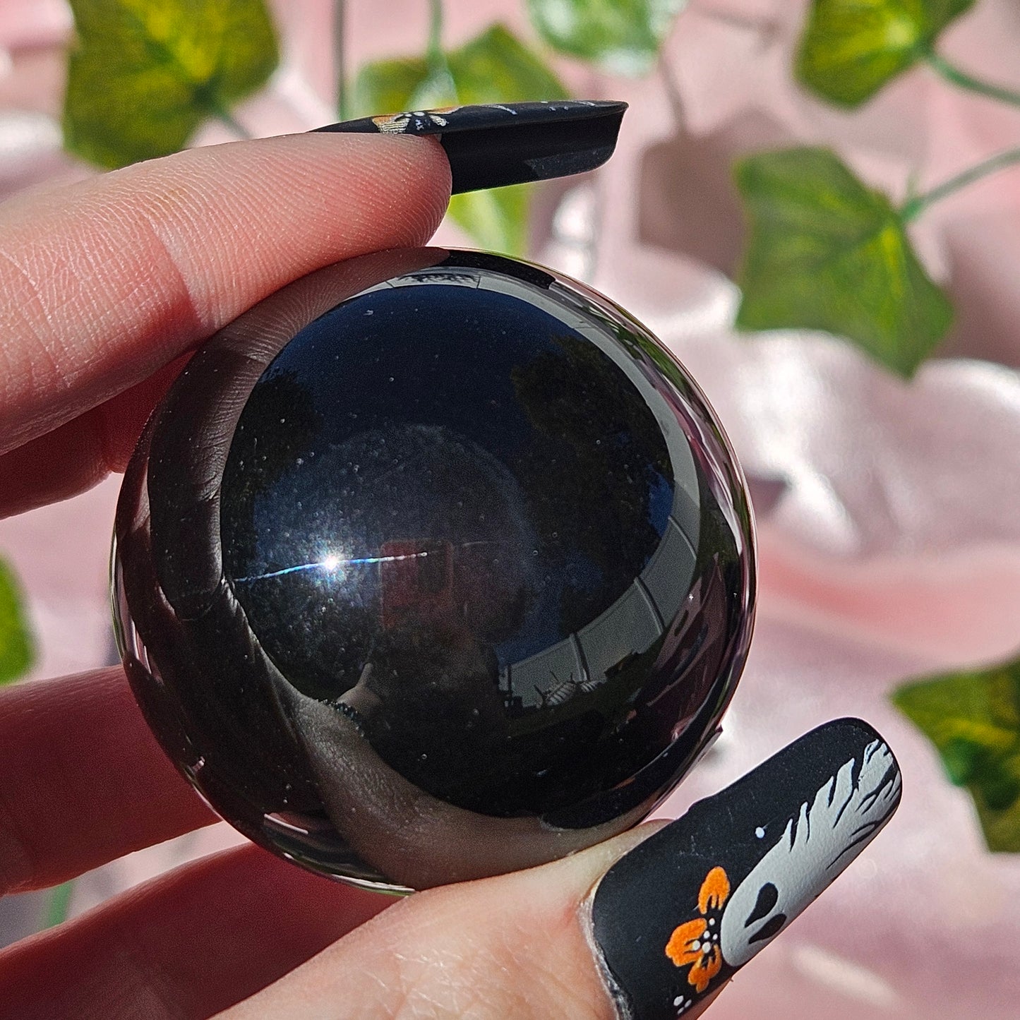 Rainbow obsidian sphere