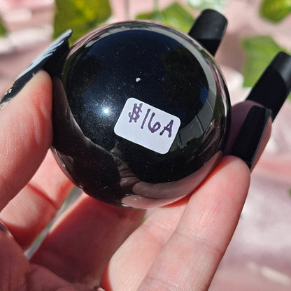 Rainbow obsidian sphere
