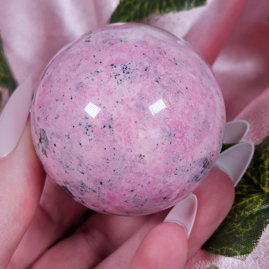 Peruvian bubble gum pink rhodonite sphere