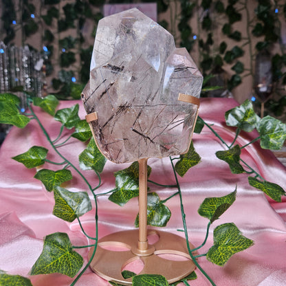 Black tourmaline & rutile in quartz on a stand