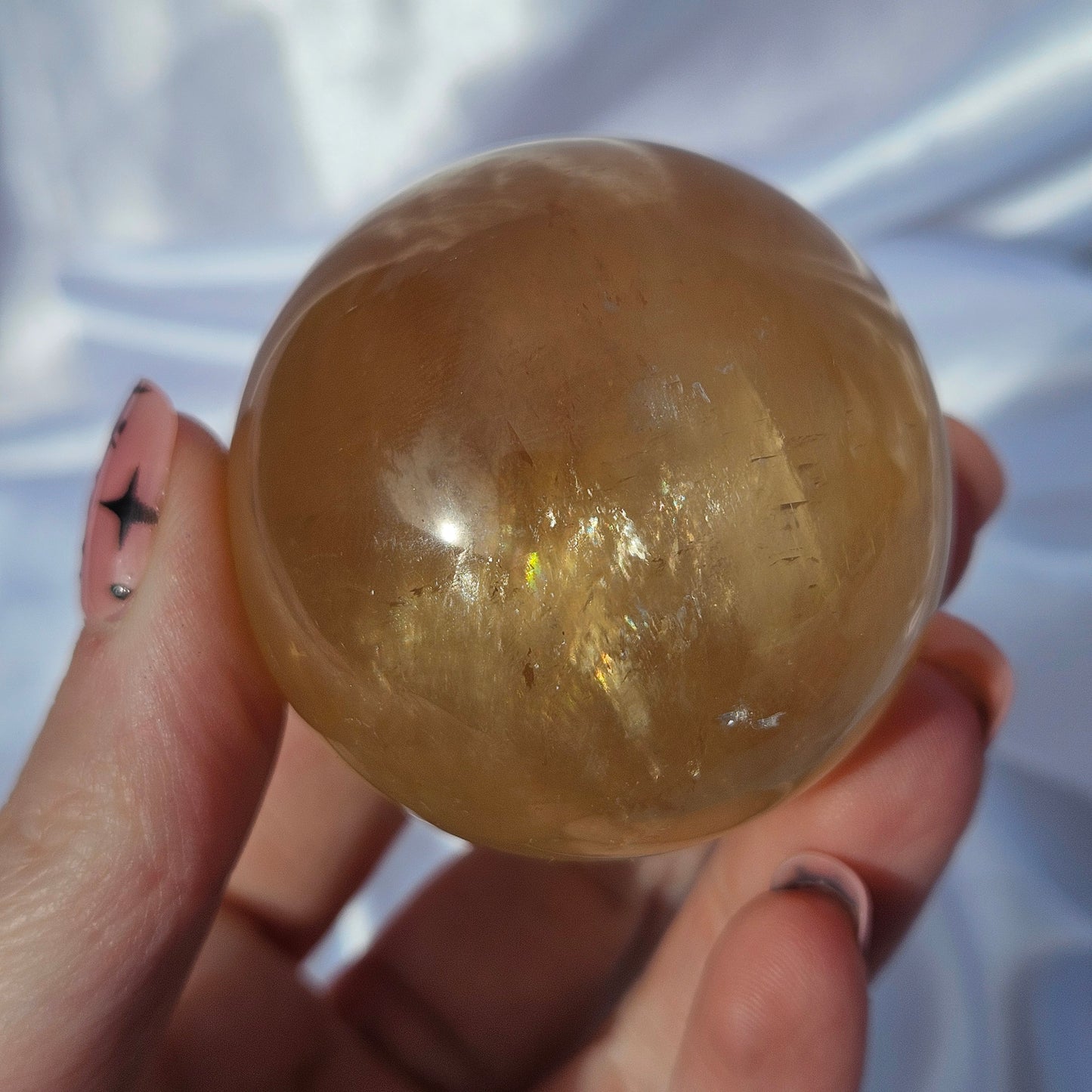 Optical honey calcite sphere