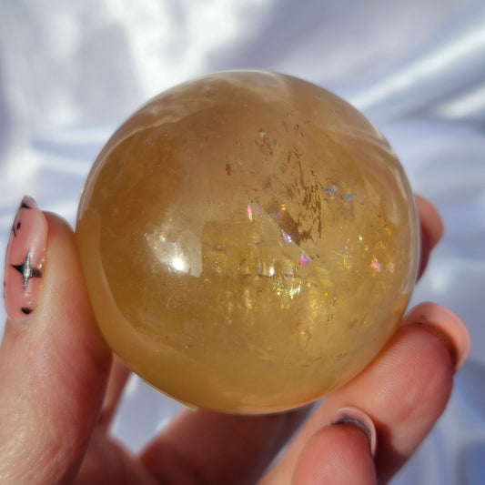 Optical honey calcite sphere