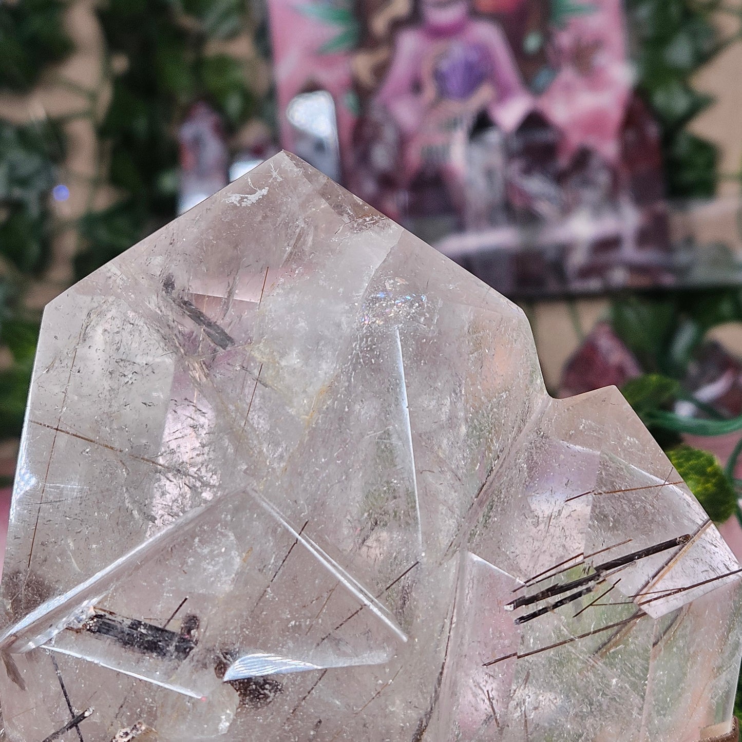 Black tourmaline & rutile in quartz on a stand