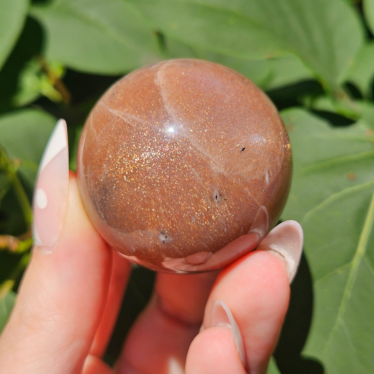 Peach moonstone/sunstone sphere