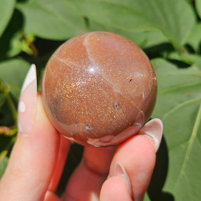 Peach moonstone/sunstone sphere