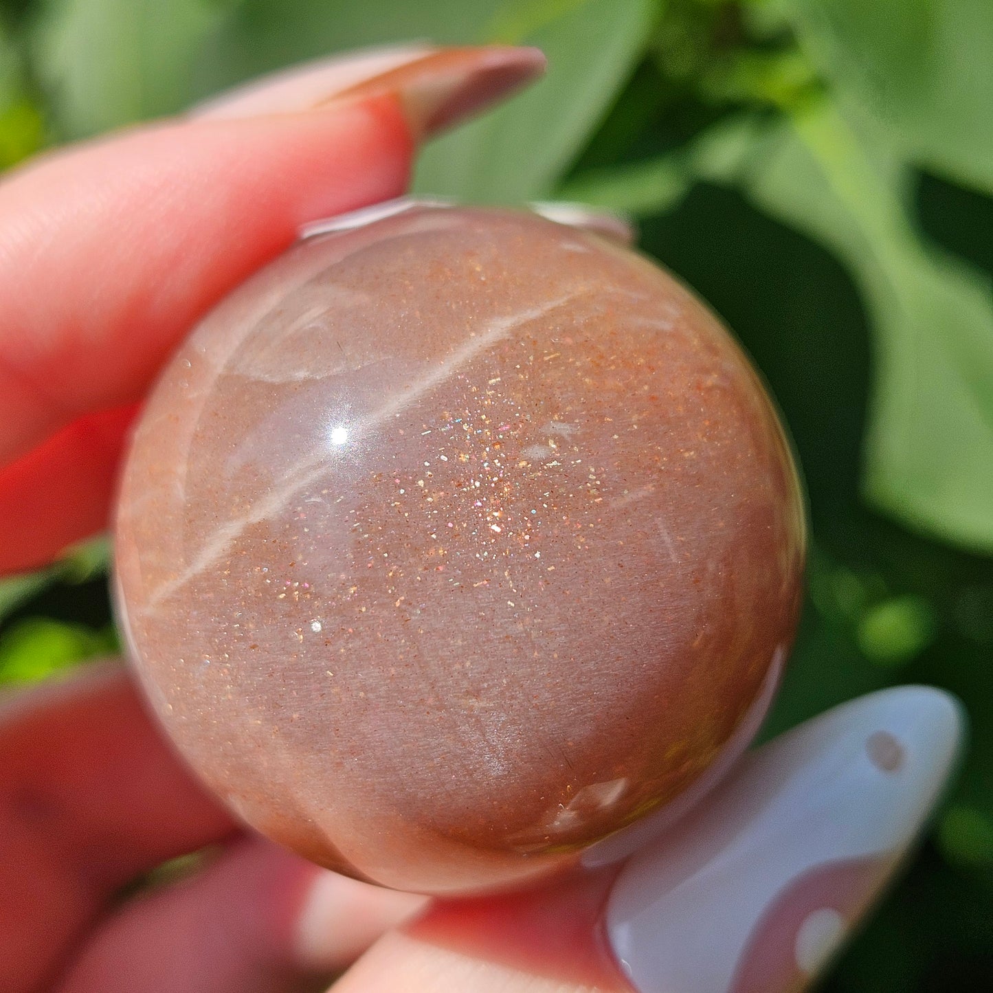 Peach moonstone/sunstone sphere