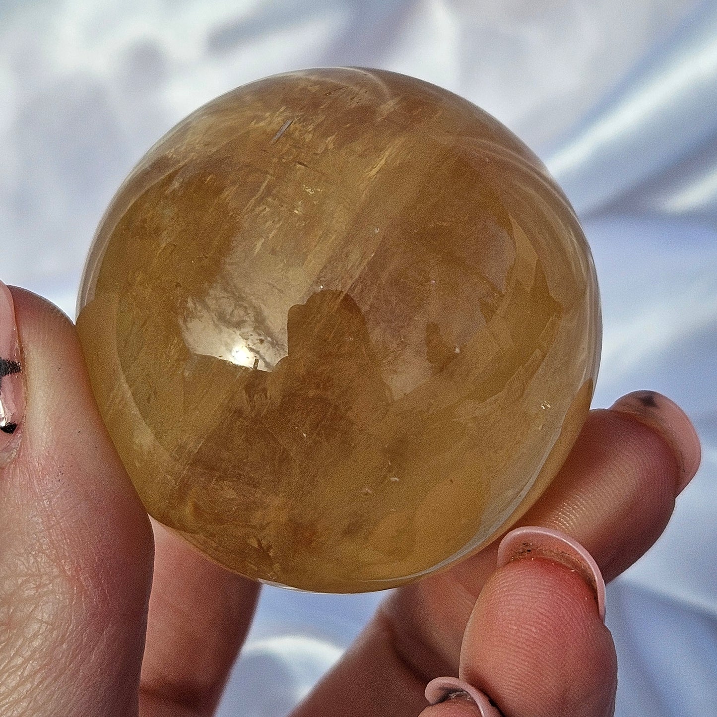 Optical honey calcite sphere