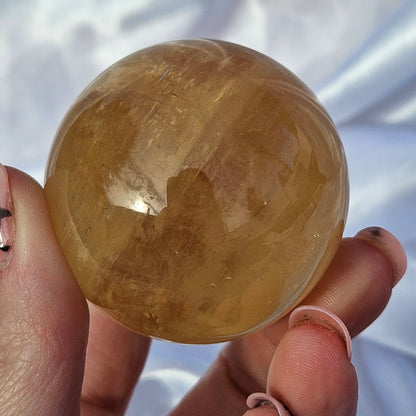 Optical honey calcite sphere