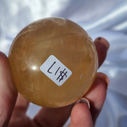 Optical honey calcite sphere