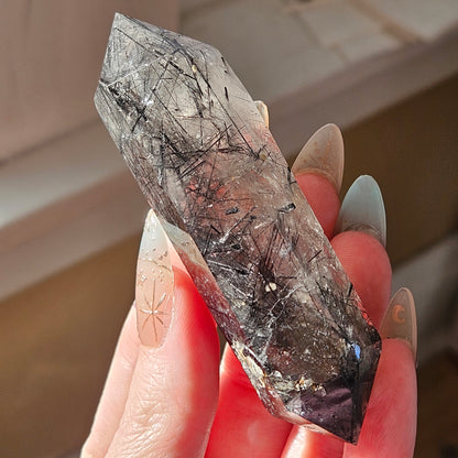 Black tourmaline in quartz double point