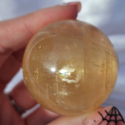 Optical honey calcite sphere
