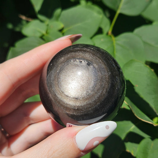Silver sheen obsidian sphere