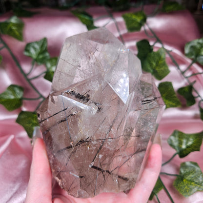 Black tourmaline & rutile in quartz on a stand