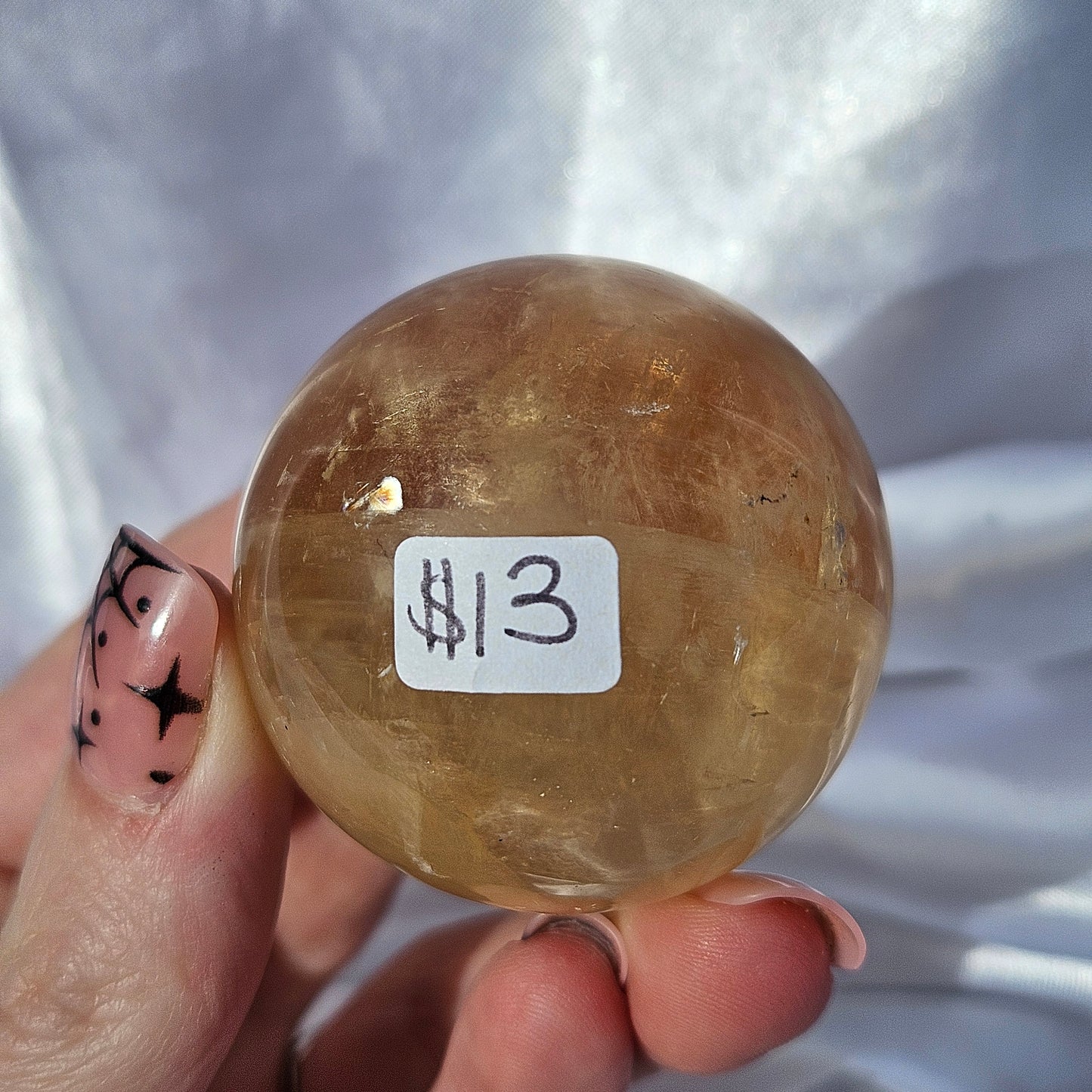 Optical honey calcite sphere