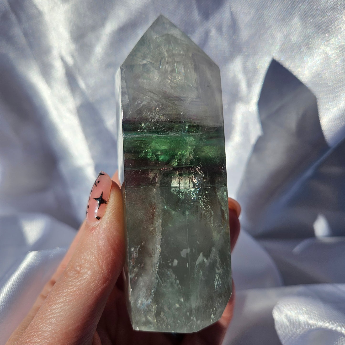 Moody green fluorite tower