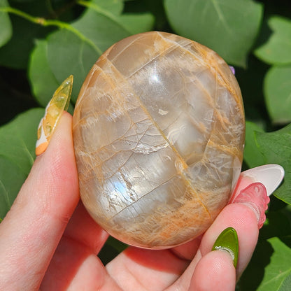 Peach moonstone palm stone