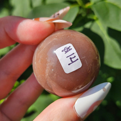 Peach moonstone/sunstone sphere