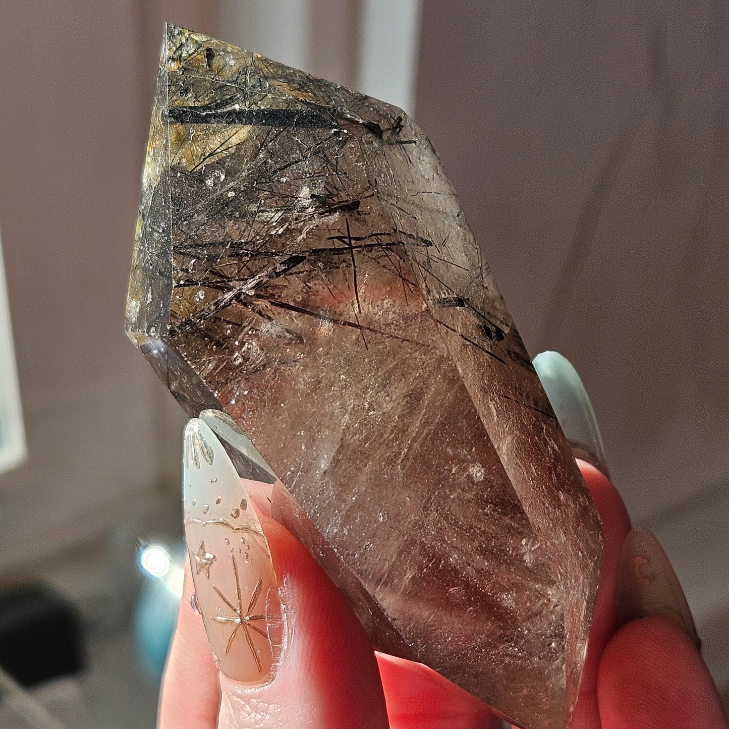 Black tourmaline in quartz double point