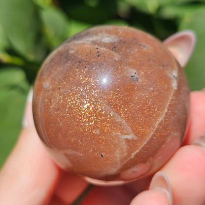 Peach moonstone/sunstone sphere