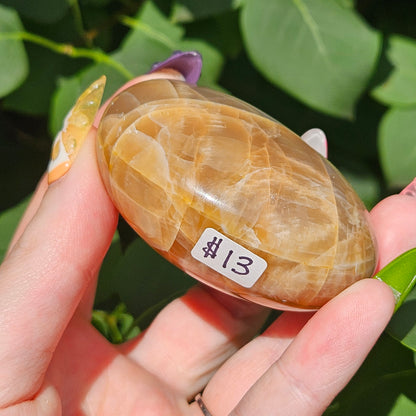 Peach moonstone palm stone
