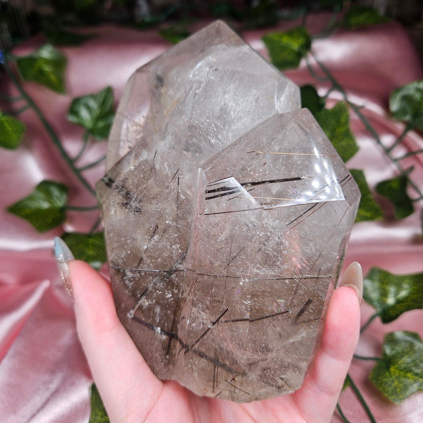 Black tourmaline & rutile in quartz on a stand