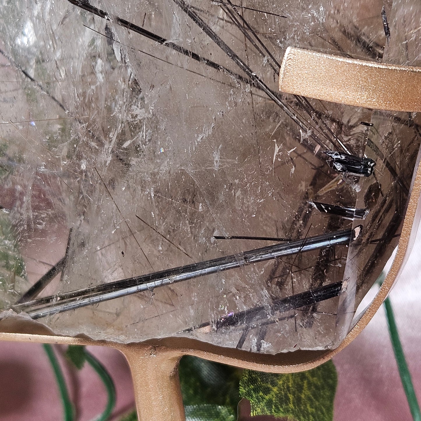 Black tourmaline & rutile in quartz on a stand