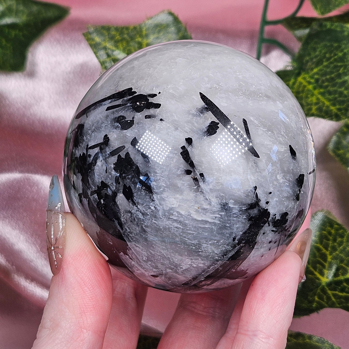 Black tourmaline in quartz sphere