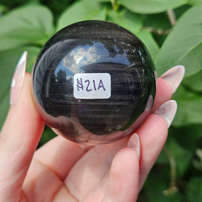 Silver sheen obsidian sphere