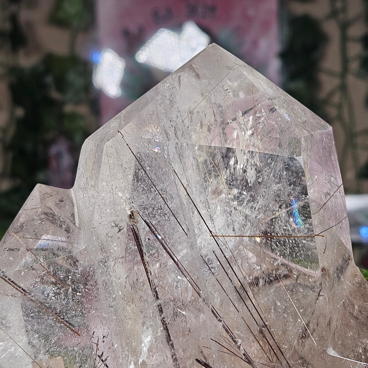 Black tourmaline & rutile in quartz on a stand
