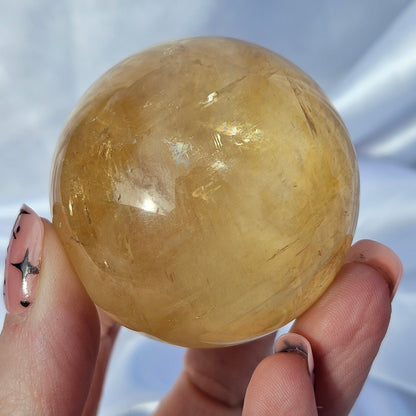 Optical honey calcite sphere