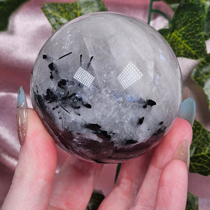 Black tourmaline in quartz sphere