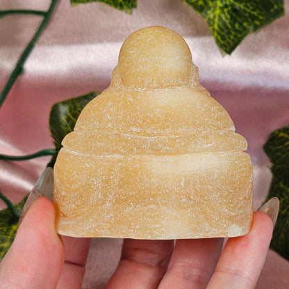 Orange calcite Buddah