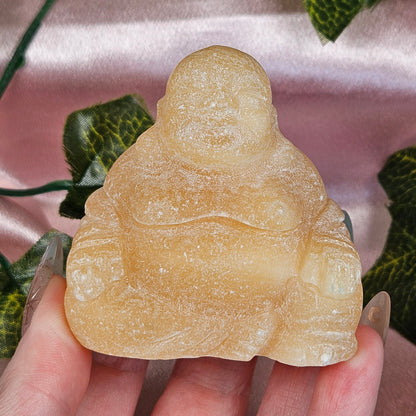 Orange calcite Buddah